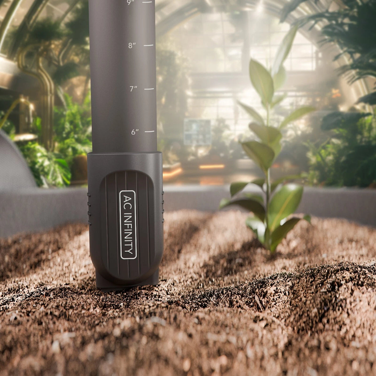 Black moisture sensor probe tool with 'AC Infinity' branding in a greenhouse setting