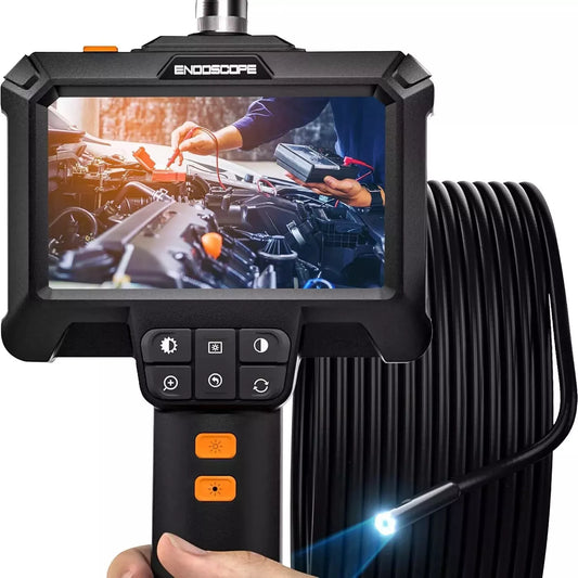 Handheld industrial endoscope/borescope being used by mechanic with electrical test kit under car hood
