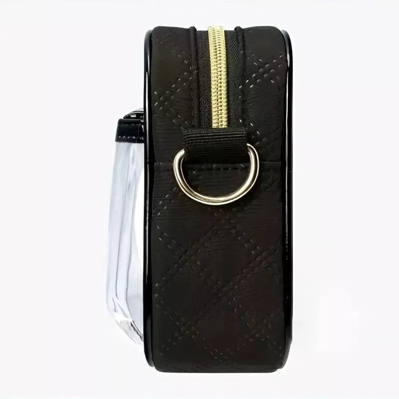 Black textured pouch with embroided leather edges, & gold zipper and ring detail on a white background.
