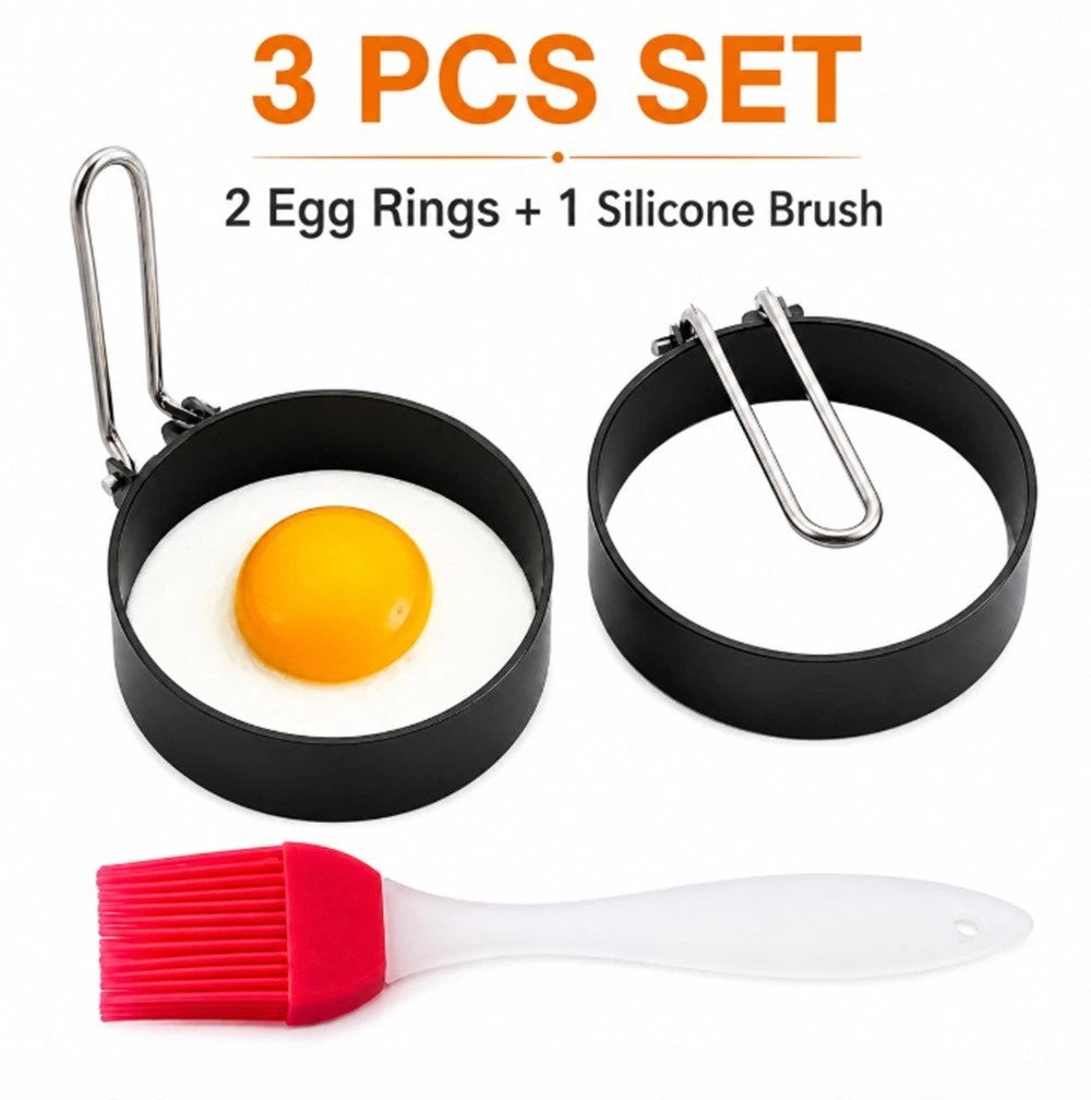 Three-piece cooking set with two egg ring molds and a silicone brush on a white background.