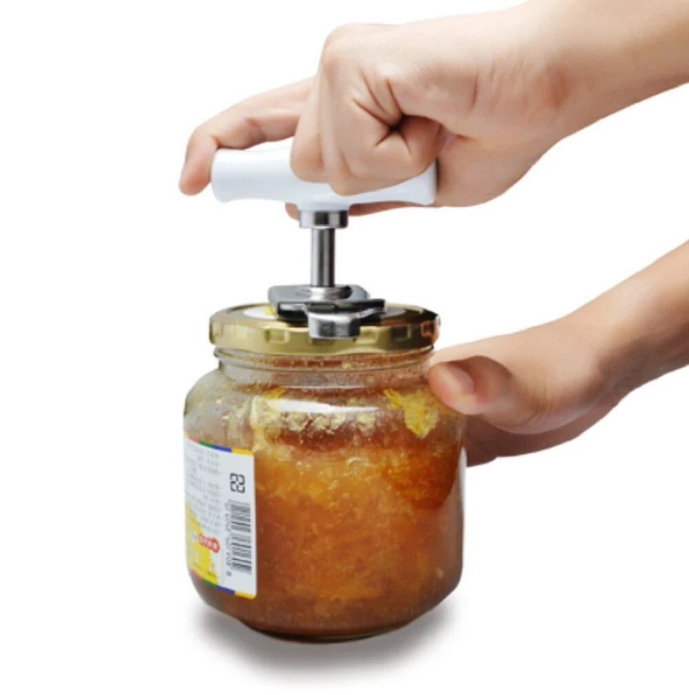 Hand using a jar opener on a jar of preserves