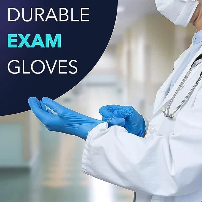 Person wearing a white coat and blue nitrile exam gloves with text 'Durable Exam Gloves' on a blurred background.