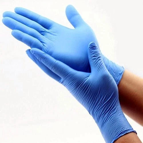 Pair of blue nitrile exam gloves on a white background