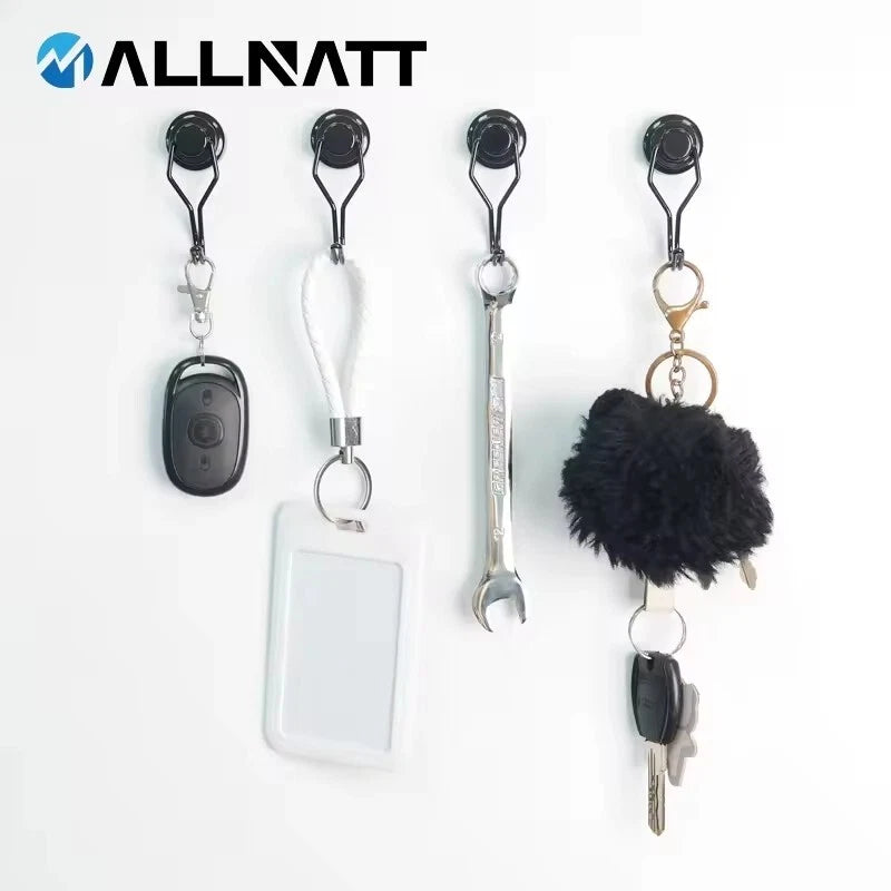 Keychain holder with various keychains on a white background
