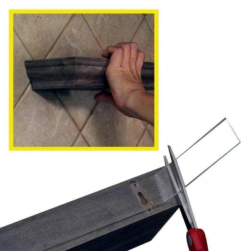 Nano tape cut with a scissors to hold mantle on tile surface.