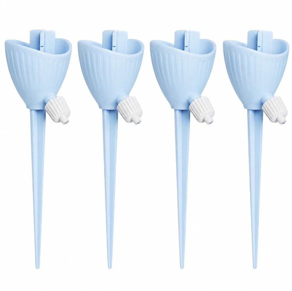 Four light blue plastic garden watering spikes with white adjustment knobs, arranged in a row on a white background
