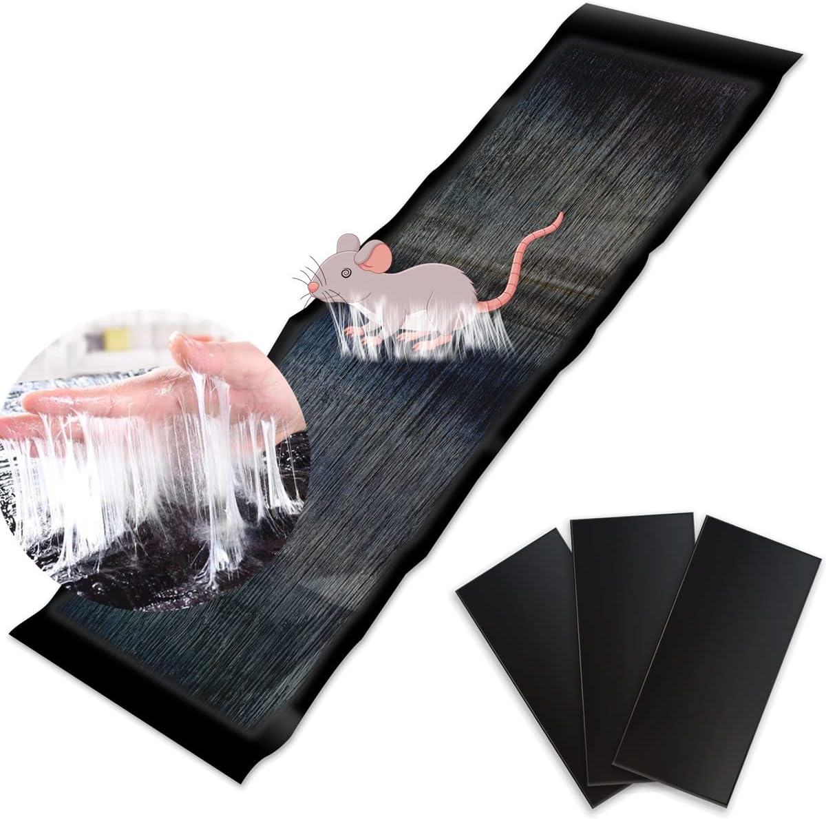 A large black glue trap laid out on a surface with an illustration of a mouse on it, alongside smaller glue traps folded and ready for use.
