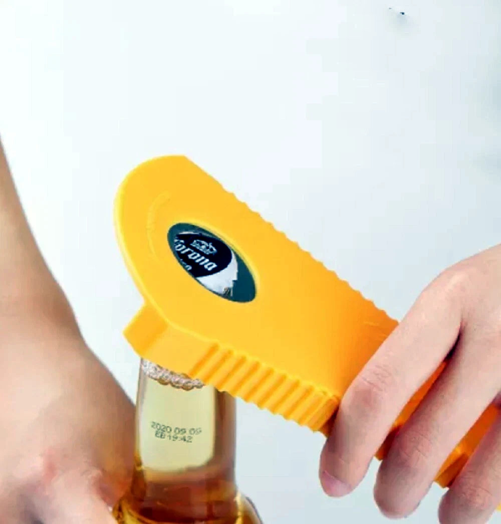 Person using a yellow bottle opener on a bottle against a white background