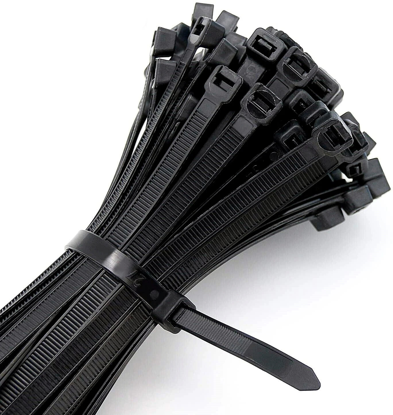 Bundle of black cable ties on a white background