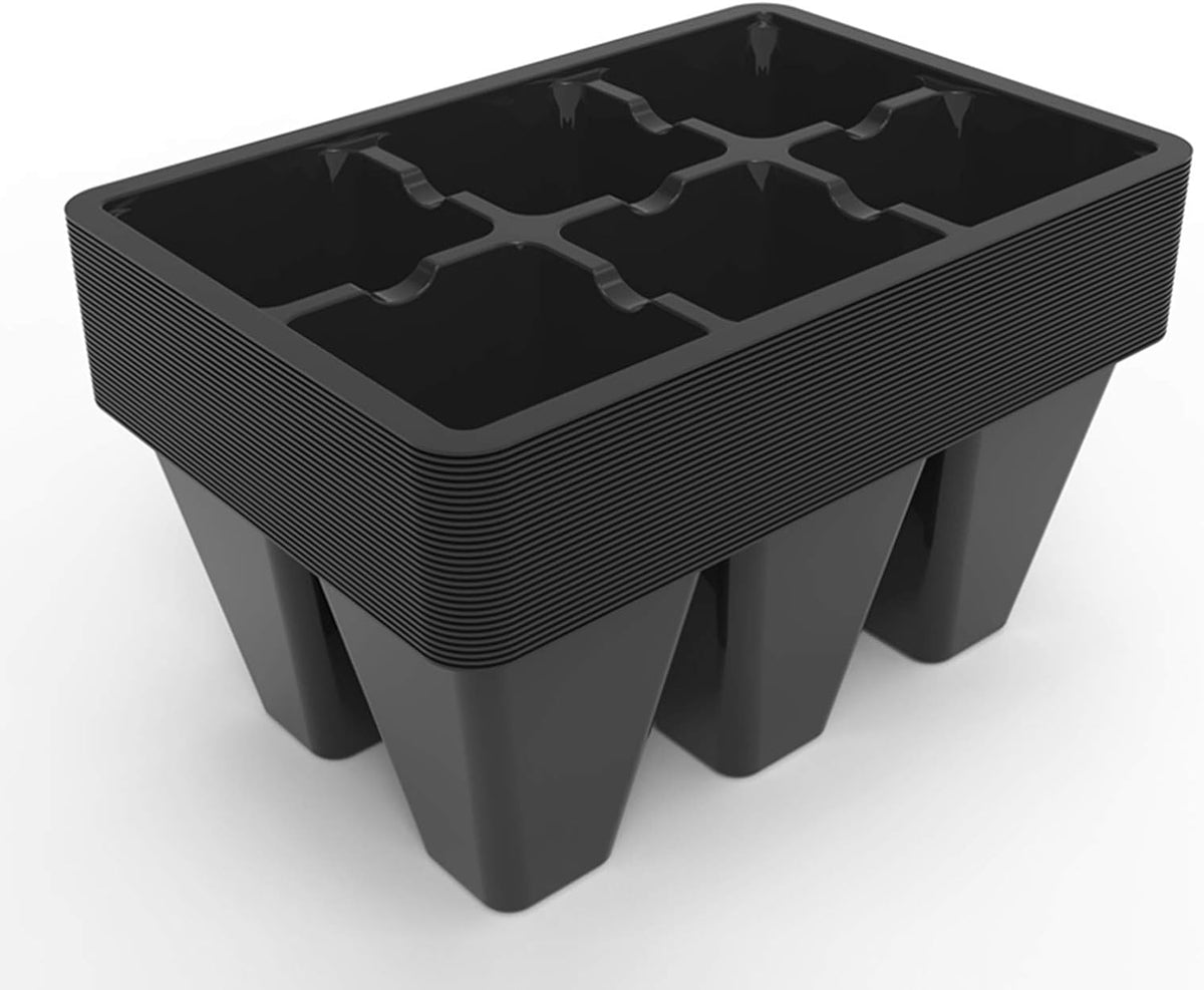 Black plastic seedling tray with multiple compartments on a white background