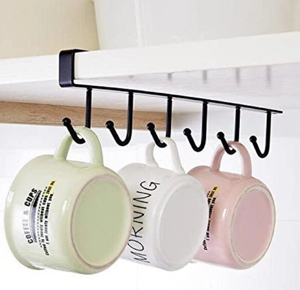 Under-the-shelf Mug holder with three hanging mugs in a kitchen setting