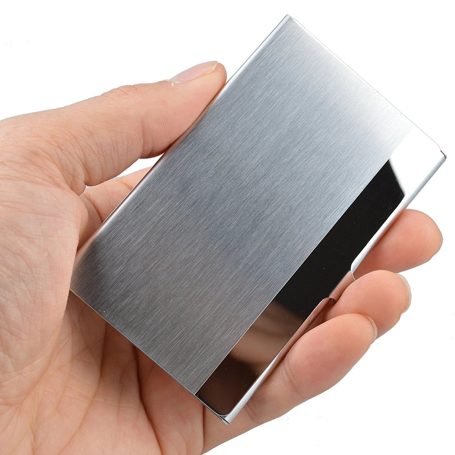 Hand holding a metallic silver stainless steel business card holder against a white background
