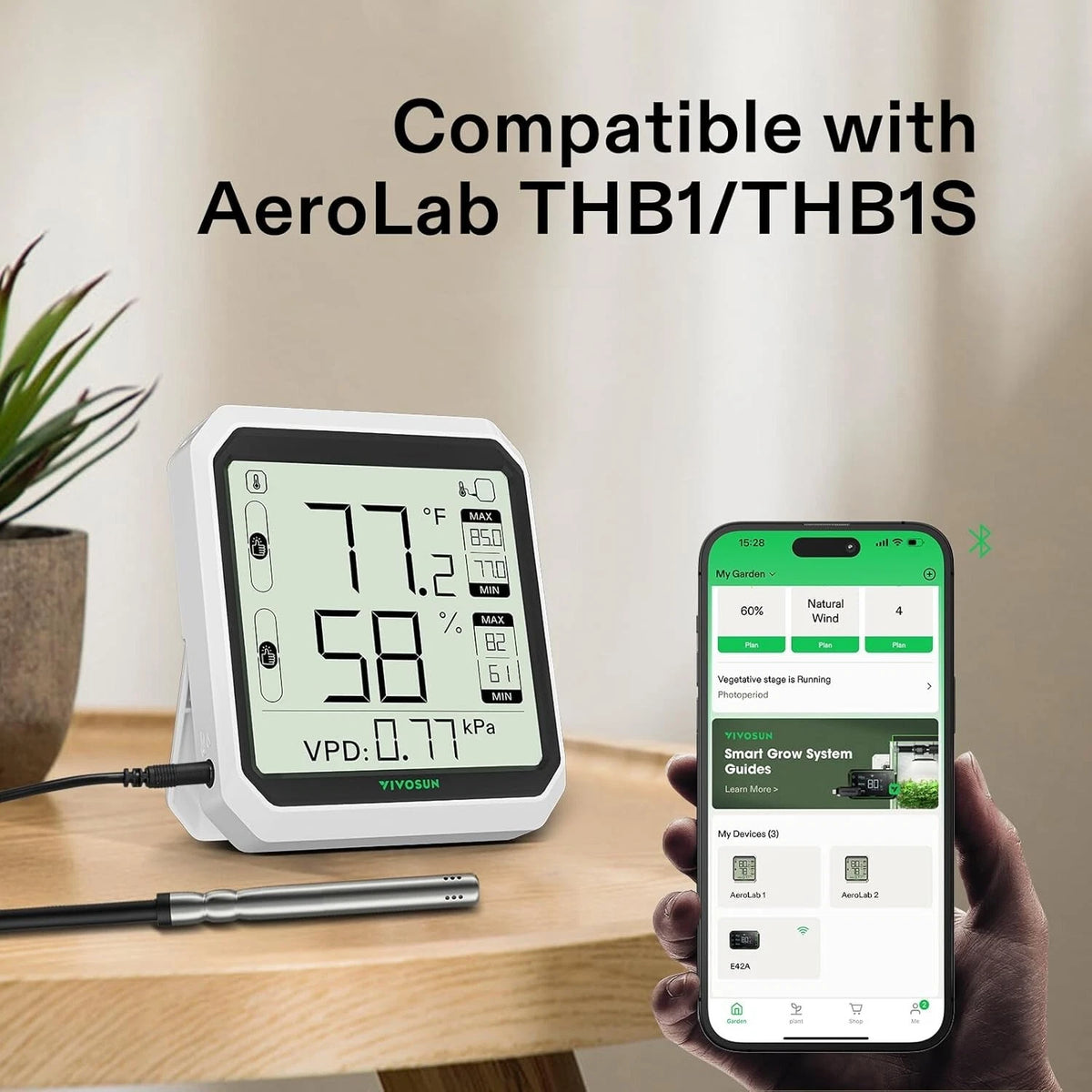 Digital thermometer feature from VIVOSUN temperature and humidity probe on a table with a smartphone displaying an app, both compatible with AeroLab THB1/THB1S.