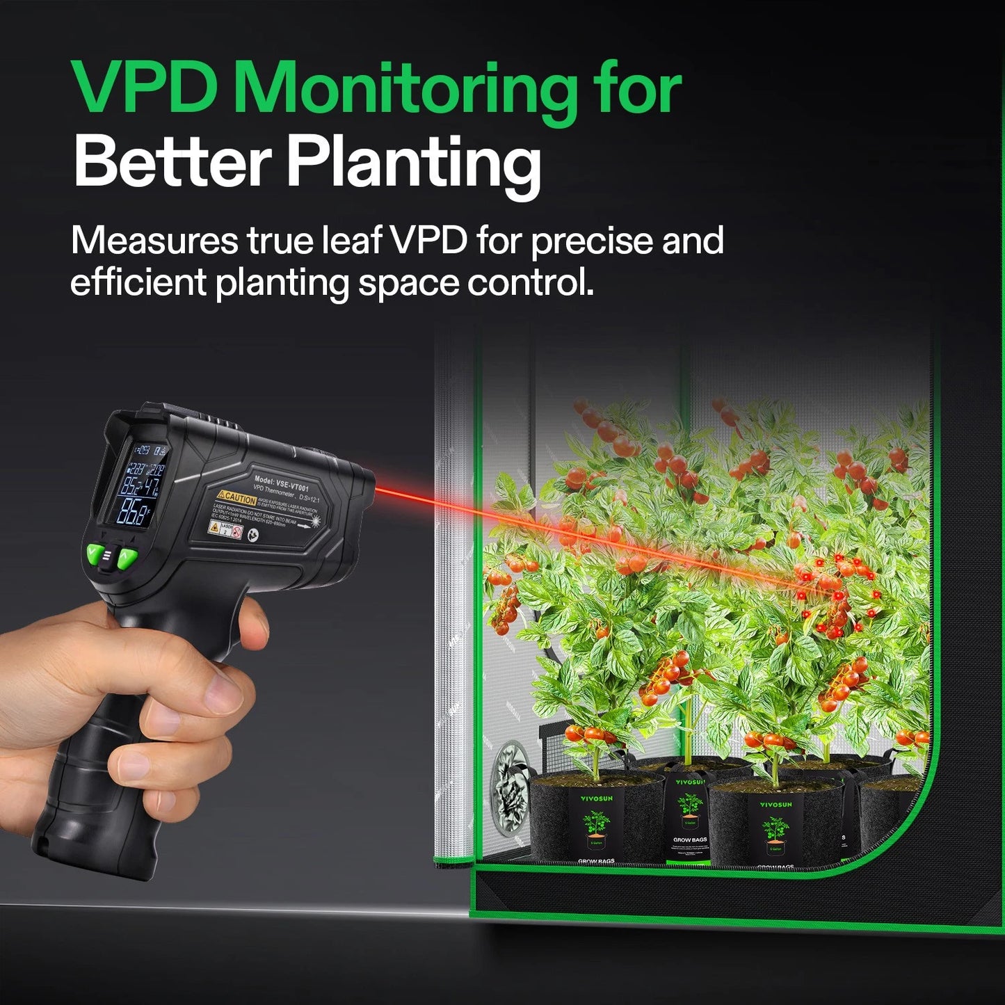 Hand holding a device measuring true leaf VPD with plants in the background